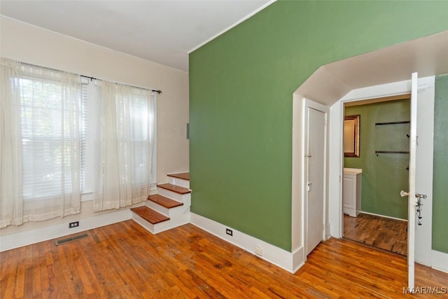 empty room featuring hardwood / wood-style floors