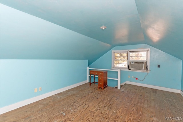 bonus room with hardwood / wood-style floors, cooling unit, and lofted ceiling