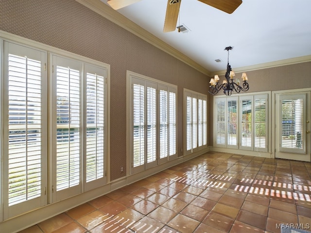 interior space featuring tile patterned flooring, ceiling fan with notable chandelier, and ornamental molding