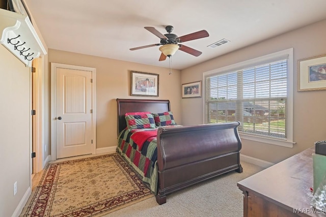 bedroom featuring ceiling fan and carpet floors