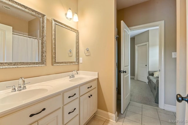 bathroom with vanity and tile patterned floors