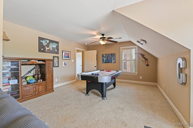 rec room featuring ceiling fan, light carpet, and vaulted ceiling