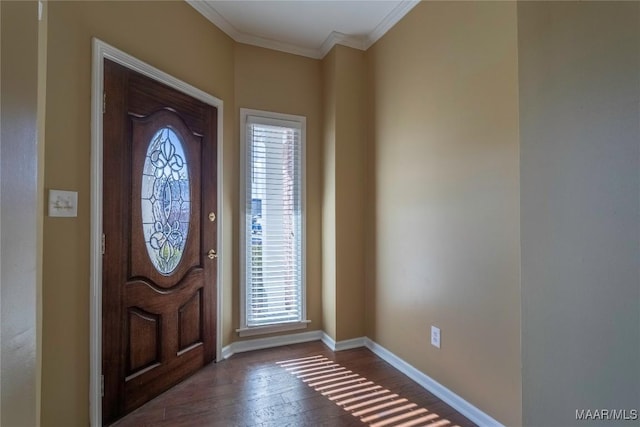 foyer entrance with hardwood / wood-style floors and ornamental molding