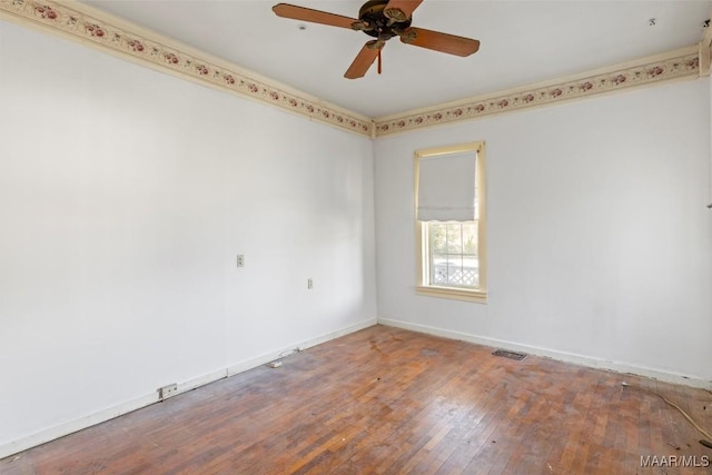 unfurnished room with wood-type flooring and ceiling fan