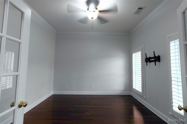 unfurnished room with dark hardwood / wood-style flooring, ceiling fan, and crown molding