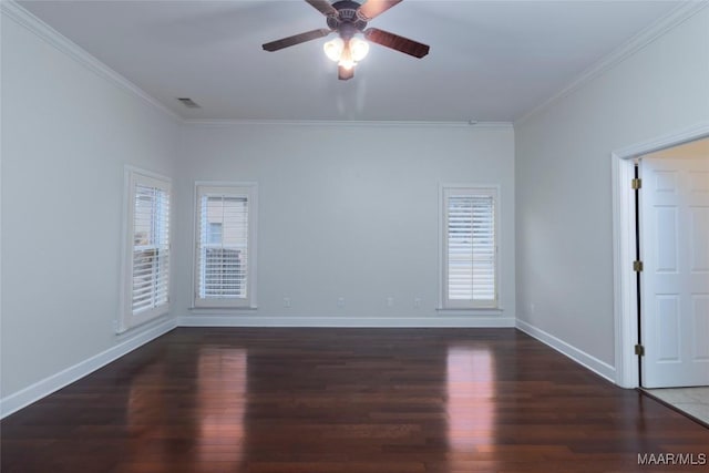 spare room with dark hardwood / wood-style flooring, ceiling fan, and crown molding