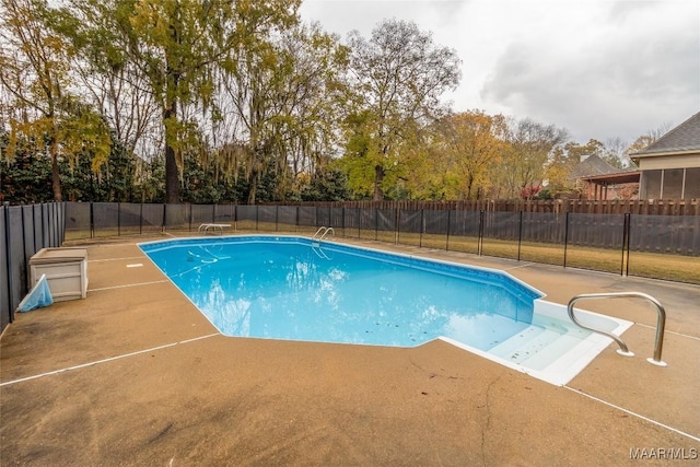 view of pool featuring a patio