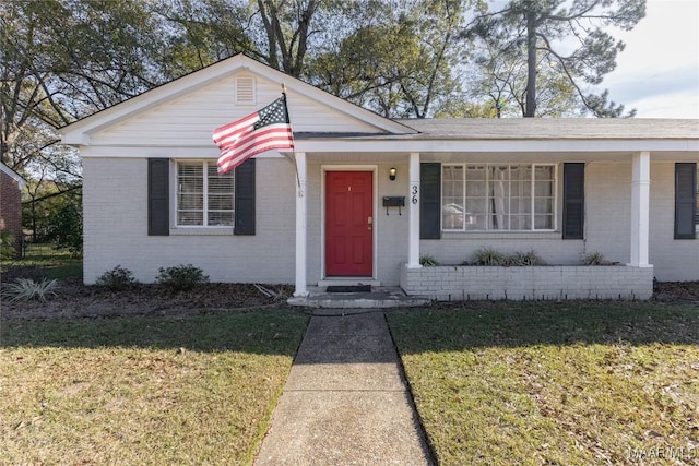 view of front of home with a front lawn