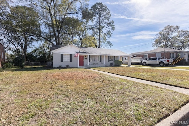 ranch-style house with a front lawn