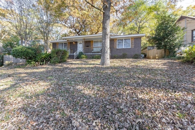 single story home with covered porch