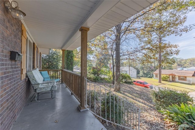 balcony featuring a porch