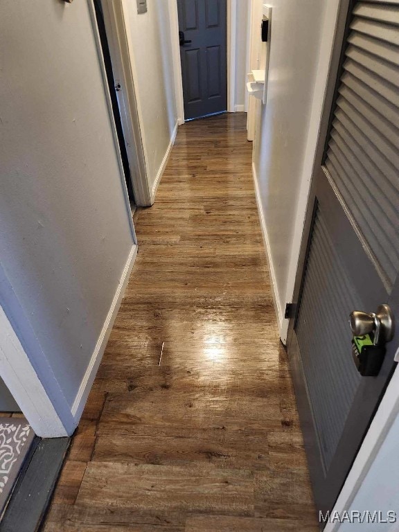 hall featuring dark hardwood / wood-style floors