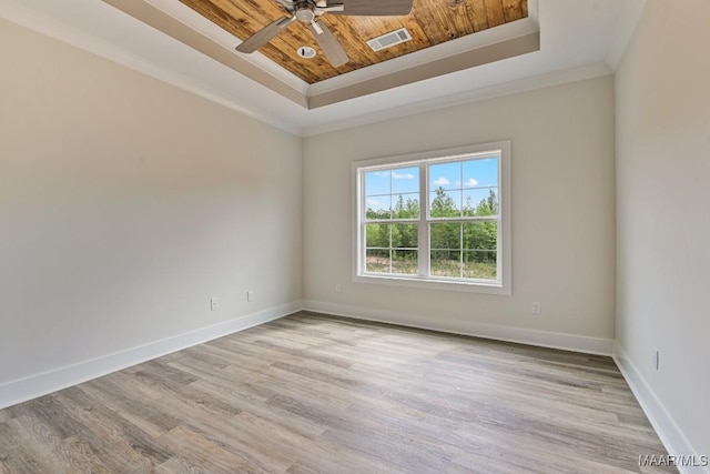 96 Madix Dr, Eclectic, AL 36024 - unfurnished room with light wood-style flooring, a raised ceiling, visible vents, and baseboards