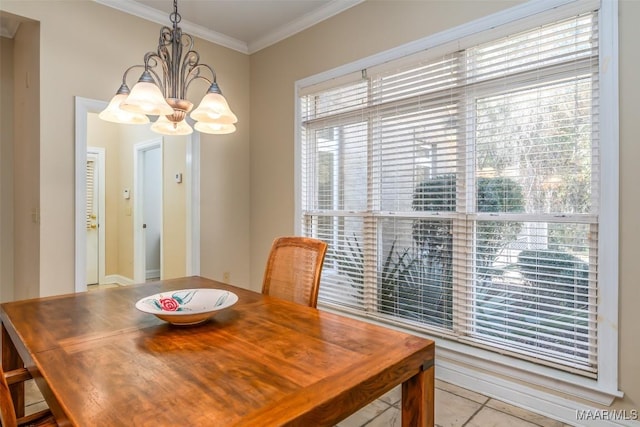 dining area with light tile patterned floors, a chandelier, and ornamental molding