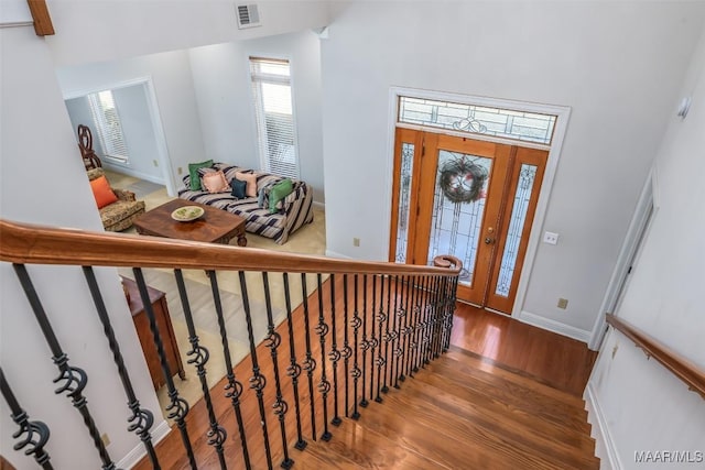 foyer with wood-type flooring