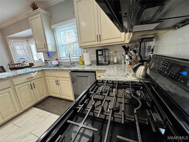 kitchen featuring black range oven, light stone counters, stainless steel dishwasher, decorative backsplash, and ornamental molding