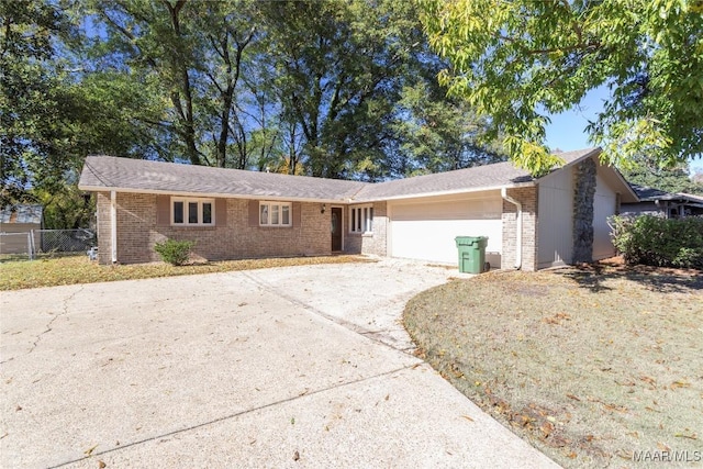 single story home featuring a garage