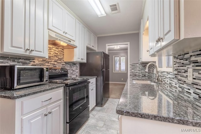 kitchen with black appliances, white cabinets, crown molding, sink, and tasteful backsplash