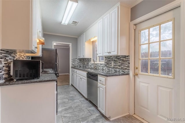 kitchen with backsplash, white cabinets, sink, stainless steel dishwasher, and ornamental molding