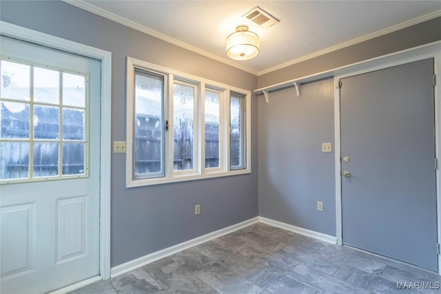 entryway with crown molding