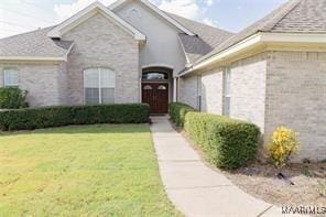 exterior space with a front yard