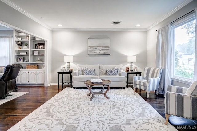 living room featuring dark hardwood / wood-style floors and ornamental molding