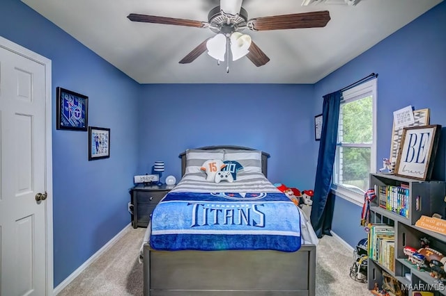 carpeted bedroom with ceiling fan