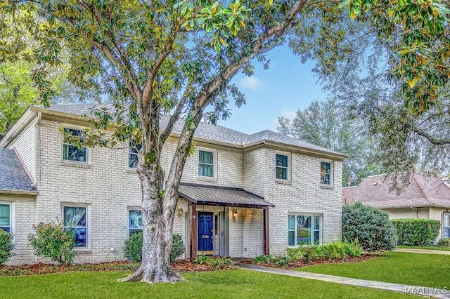 view of front of house with a front yard