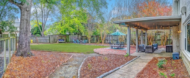 view of yard featuring a patio area