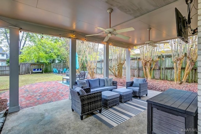 view of patio / terrace with ceiling fan and an outdoor hangout area