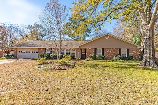 ranch-style home featuring a front lawn and a garage