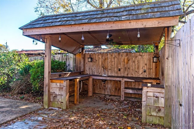 view of patio / terrace featuring ceiling fan