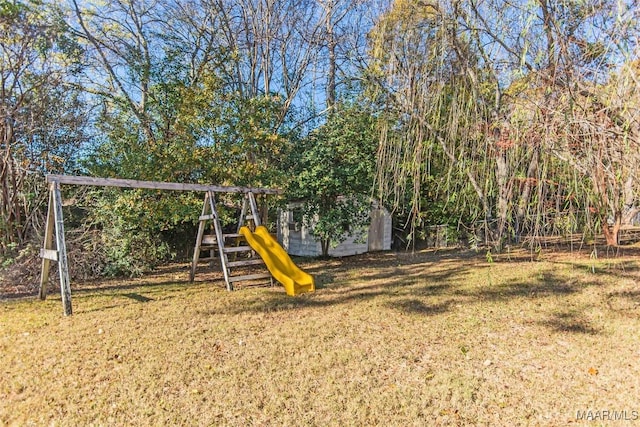 view of playground with a yard