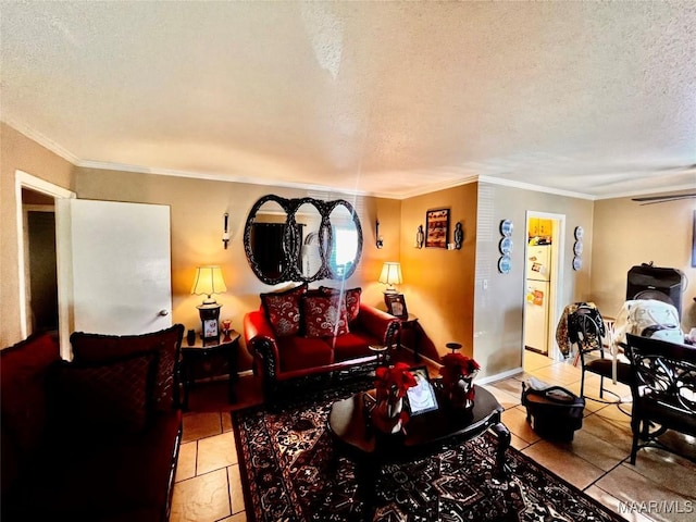 living room with ornamental molding, a textured ceiling, and light tile patterned floors