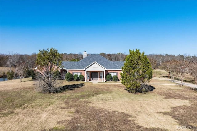 view of front of property with a front lawn