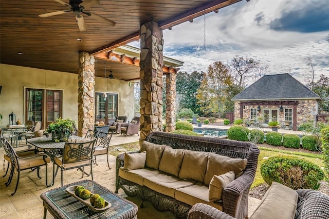 view of patio featuring outdoor lounge area and ceiling fan