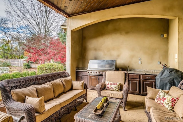 view of patio with an outdoor hangout area, area for grilling, and grilling area