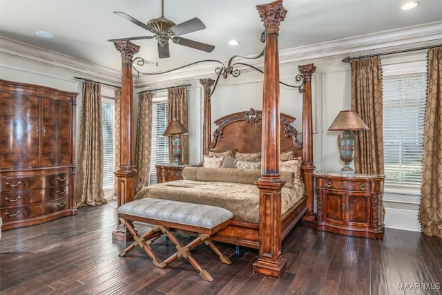 bedroom with ceiling fan, ornamental molding, and dark wood-type flooring