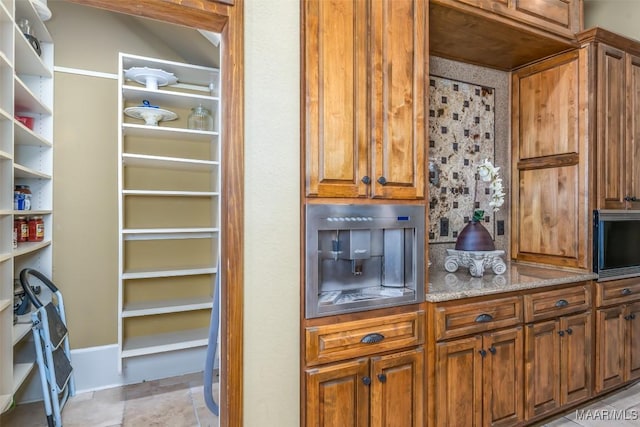 kitchen with stainless steel microwave