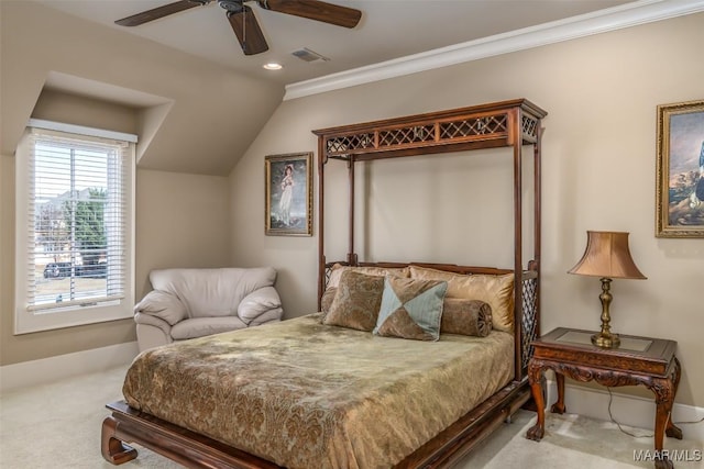 carpeted bedroom featuring vaulted ceiling, ceiling fan, and ornamental molding