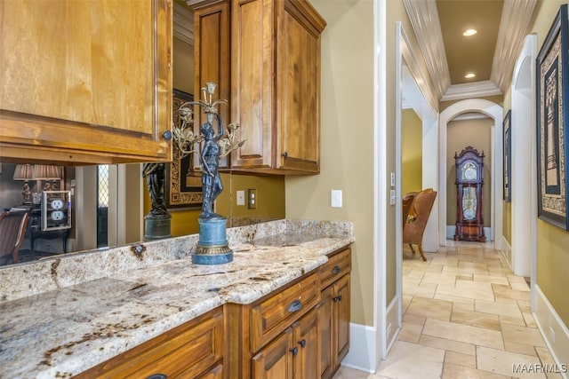 bathroom featuring vanity and ornamental molding