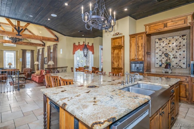 kitchen featuring a kitchen bar, a large island, dishwasher, and wood ceiling