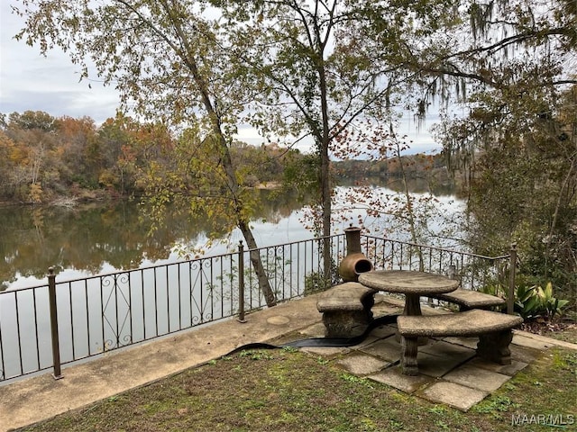 view of patio / terrace with a water view