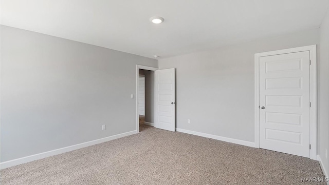 view of carpeted spare room