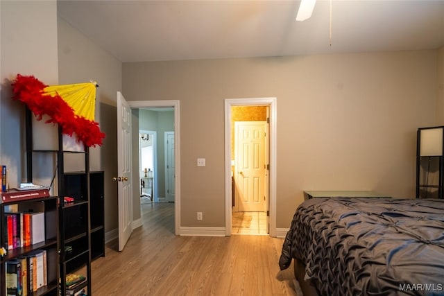 bedroom featuring light hardwood / wood-style flooring and ceiling fan