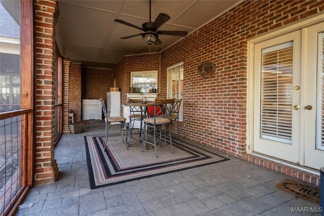 view of patio featuring ceiling fan