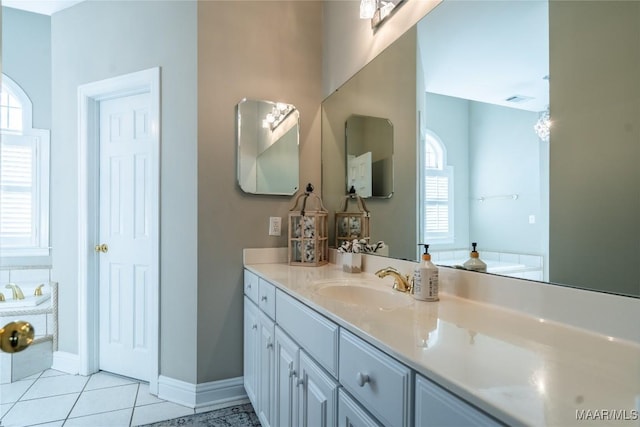 bathroom featuring tile patterned flooring and vanity