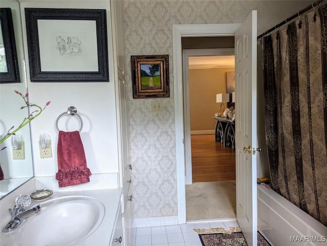 bathroom featuring tile patterned floors, shower / tub combo with curtain, and vanity