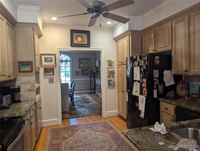 kitchen featuring light wood-type flooring, tasteful backsplash, ornamental molding, and black appliances