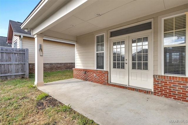 doorway to property featuring a patio area